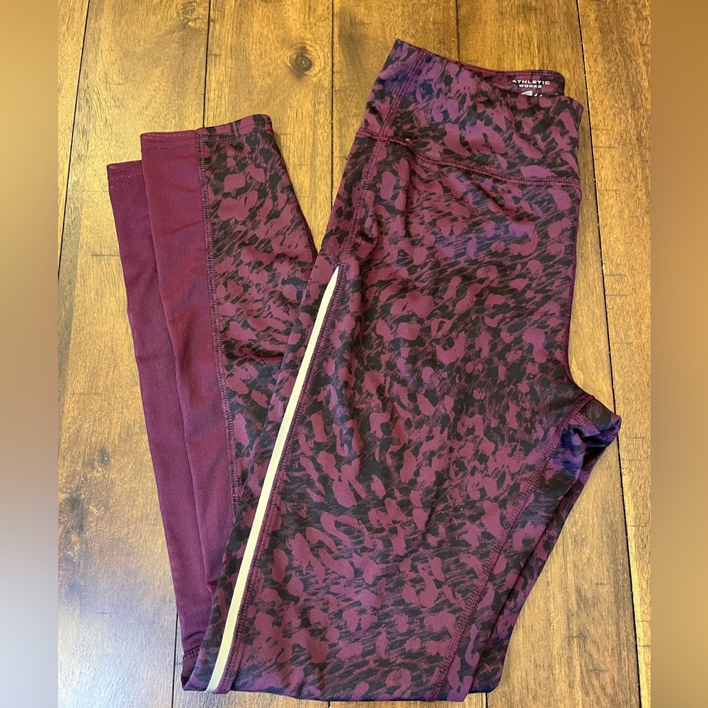 Athletic works Burgundy Tight with sheer panels on calves.